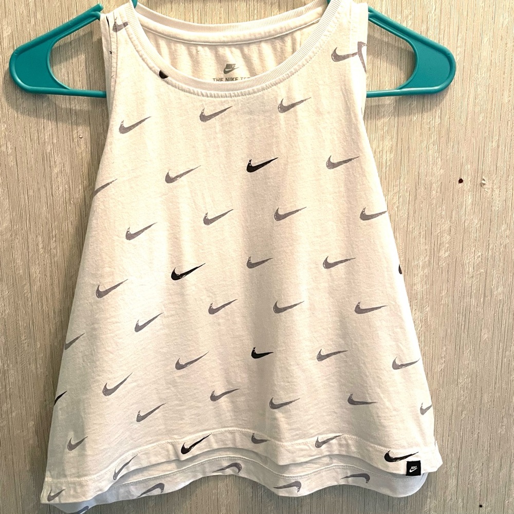 The Nike Tee Women’s, sleeveless, White with grey and black swoosh